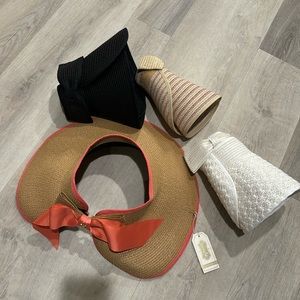 A lot of four sun hats